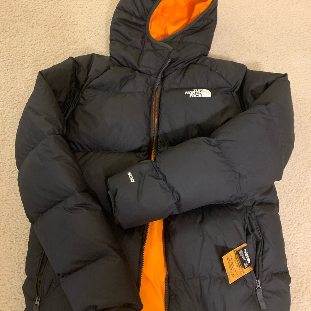 The North Face Black and Orange Puffer Jacket with Quilted Design